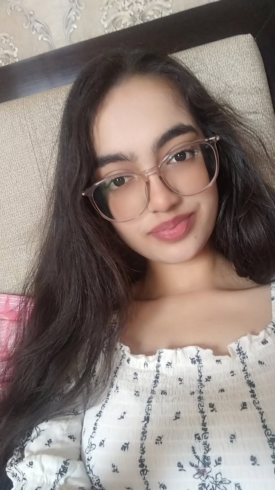 Avni with a gentle smile