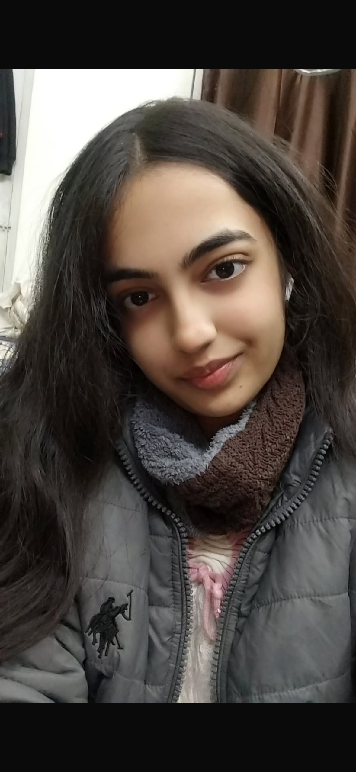 Avni in a winter jacket